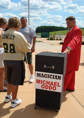 Michael Oddo in Canton Ohio at Glenn Oak High School Performing Strolling Magic
